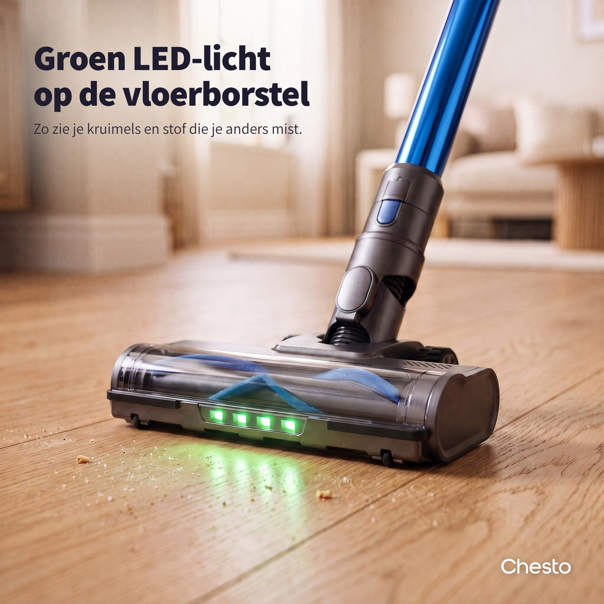 Vloerborstel van de Chesto T1 met groen LED-licht dat kruimels en stof op de houten vloer zichtbaar maakt